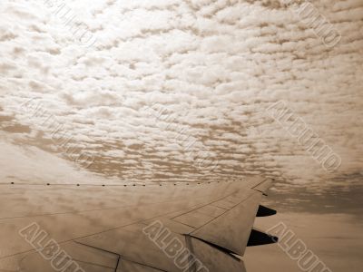 Aeroplane High in the Clouds sepia