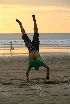 gymnast on a beach