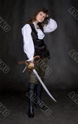 The girl - pirate with a sabre in hands