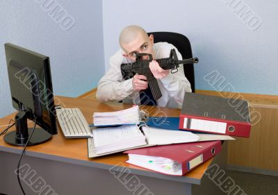 Accountant armed with a rifle