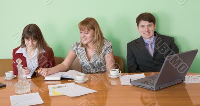 Business team sits at the table