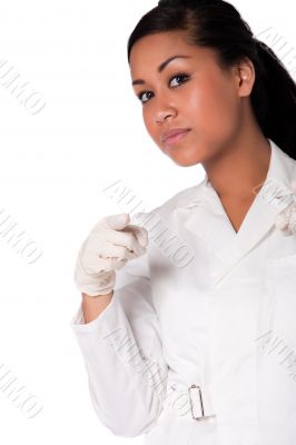 Portrait of a beautifull Indonesian nurse pointing her finger
