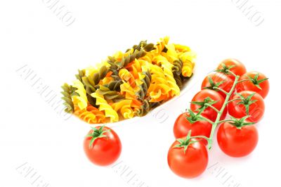multicolored pasta one tomato and tomato bunch