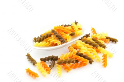 multicolored pasta on a white background