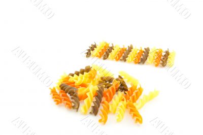 multicolored pasta on a white background