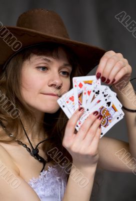 Portrait girl with a playing-cards