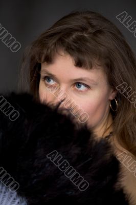 Portrait of the girl with a fan