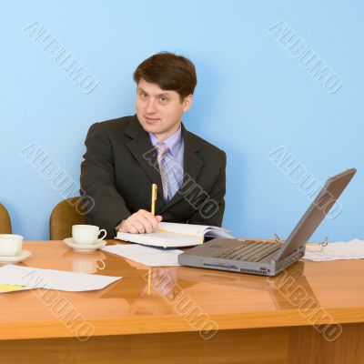 Business team sits at the table