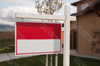 Blank Real Estate Sign in Front of House