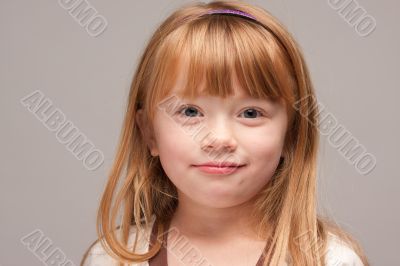 Portrait of an Adorable Red Haired Girl