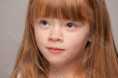 Portrait of an Adorable Red Haired Girl