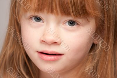 Portrait of an Adorable Red Haired Girl