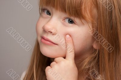 Portrait of an Adorable Red Haired Girl