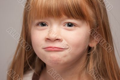 Portrait of an Adorable Red Haired Girl
