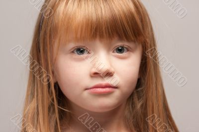 Portrait of an Adorable Red Haired Girl