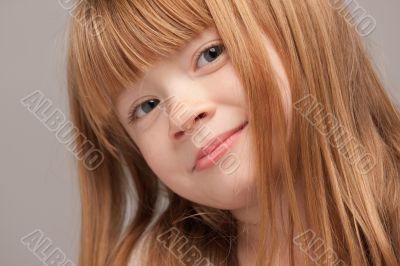 Portrait of an Adorable Red Haired Girl
