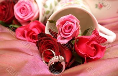 Bouquet of roses with wedding rings