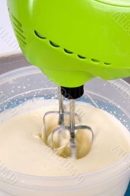 mixermachine is making whipped cream