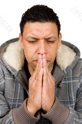 aruban male is thinking and praying