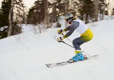 Woman rushing on skis