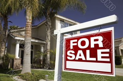 For Sale Real Estate Sign and House
