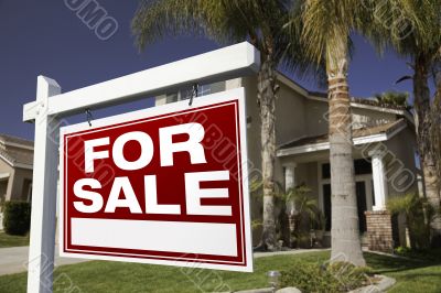 For Sale Real Estate Sign and House