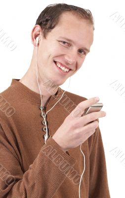 Young caucasian man listening to music