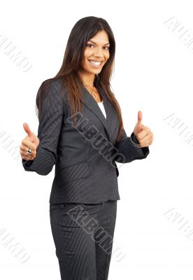 Beautiful brunette businesswoman giving thumbs up