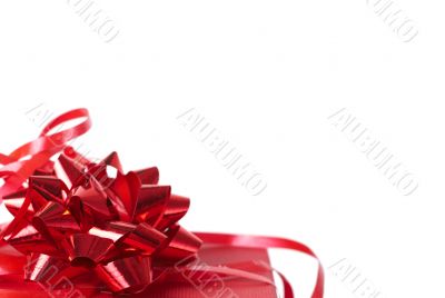 Red gift box with bows on white