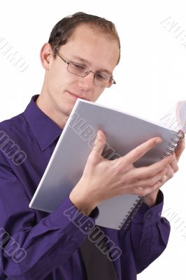 Businessman reading the book