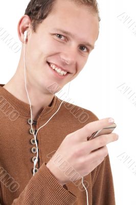 Young caucasian man listening to music