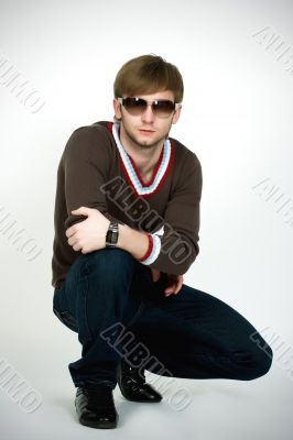blonde man in modern sunglasses