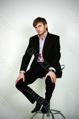 attractive man on high chair