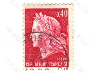 Old red french postage stamp with woman