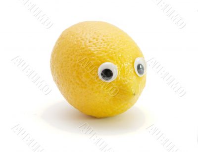 Funny lemon with eyes on white