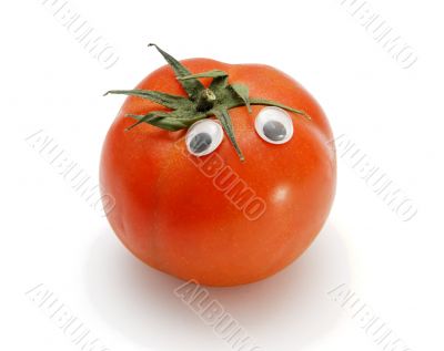 Funny red tomato with eyes on white