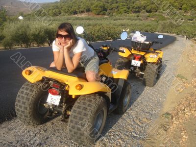 Pretty girl on quadricycle