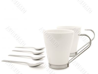 white modern cups and spoons