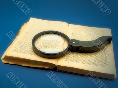 magnifier at the book