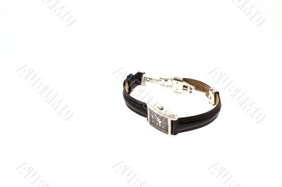 female silver watch with black belt