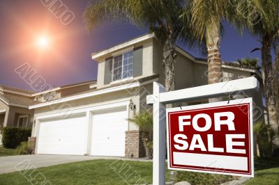Red For Sale Real Estate Sign and House