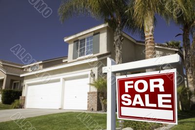 Red For Sale Real Estate Sign and House