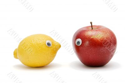 Funny lemon and apple with eyes