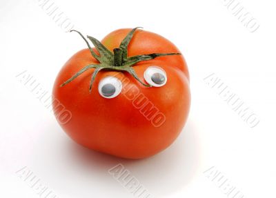 Funny tomato with eyes isolated