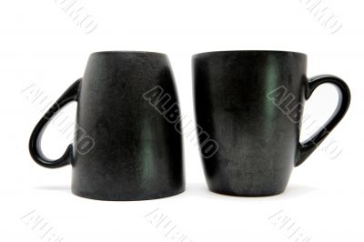 Two black cups up and down isolated