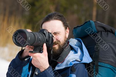 tourist with the big camera