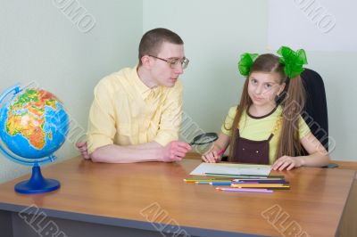 Girl and brother with colour pencils