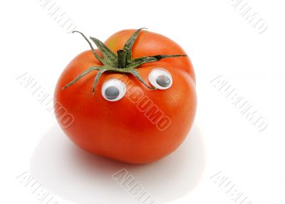 Funny tomato with eyes isolated