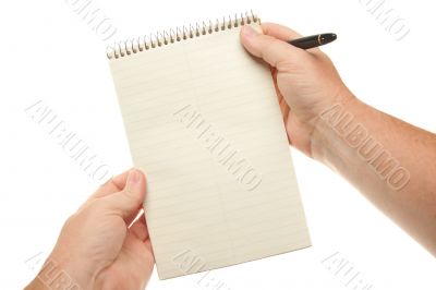 Male Hands Holding Pen and Pad of Paper