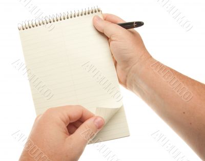 Male Hands Holding Pen and Pad of Paper